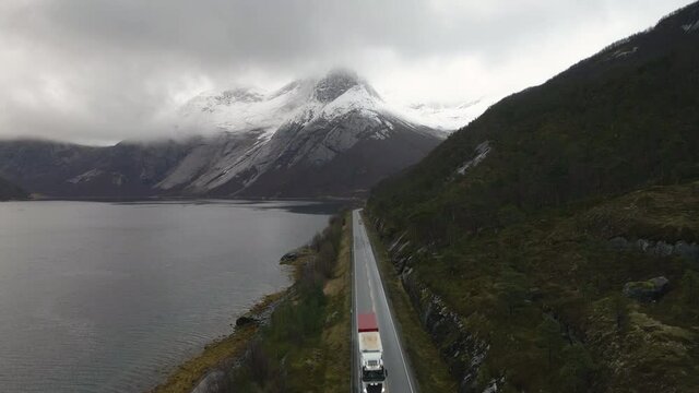 Scenic road next to Tysfjord with epic drone view of Stetind mountain, Norway