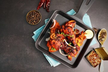 Tandoori chicken is a popular roast chicken recipe from India.   Tandoor is a traditional wood...