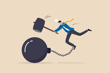 Break free or breaking bad habits or routines for freedom, pay off debt, destroy shackle or anxiety burden, escape and liberation concept, confidence businessman use hammer to break heavy chain burden