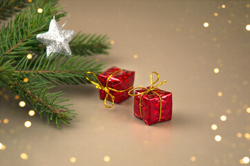 Gifts on the background of a fir branch