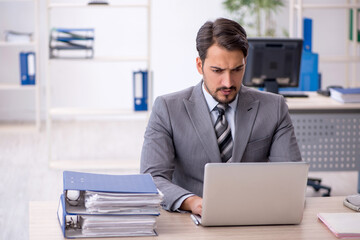 Young businessman employee working in the office