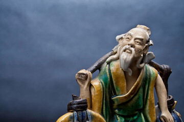 Obraz premium Old Asian Man Figurine