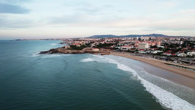 Aerial footage of Carcavelos beach Lisbon.