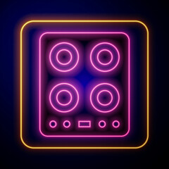 Glowing neon Gas stove icon isolated on black background. Cooktop sign. Hob with four circle burners. Vector