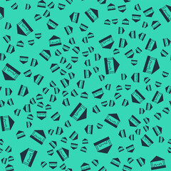 Black Sandbox for kids with sand and umbrella icon isolated seamless pattern on green background. Vector