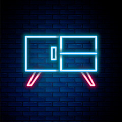 Glowing neon line Chest of drawers icon isolated on brick wall background. Colorful outline concept. Vector