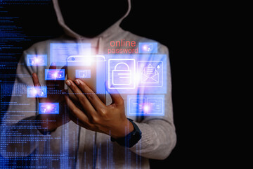 Hackers type and search for codes and data on laptop keyboards to hack into cyberspace.