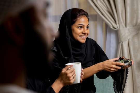 Emirati Arab young women playing game