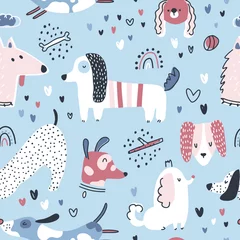 Foto auf Leinwand Dogs seamless pattern. Cute animals in simple naive hand-drawn Scandinavian trendy cartoon style. Ideal for a nursery, baby clothes, textiles, packaging. Vector background. © Світлана Харчук