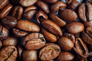 Naklejka premium Coffee roasted beans texture background. Beverage, food, morning refreshment