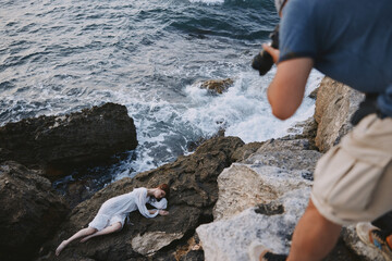 woman lies on a stone near the sea nature landscape