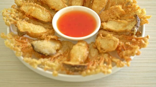 deep fried Enoki mushroom and King Oyster mushroom with spicy dipping sauce - vegan food style