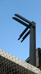Steel support pillars for roof or ceiling at construction site.