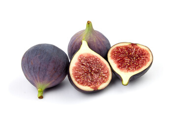 Fig fruit with ripe red halves isolated on white