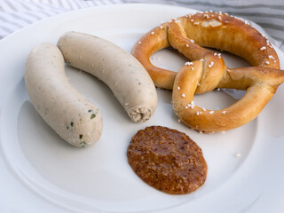 Weisswurst Bavarian or German White Sausage Pair with Pretzel and Sweet Mustard