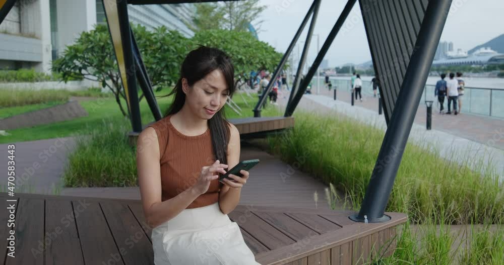 Canvas Prints woman use smart phone at outdoor park