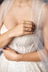 bride's neckline in a wedding dress in sequins