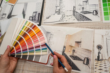 Architectural designer work with color pallete and house sketch