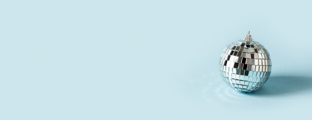 Disco ball celebration concept on blue background