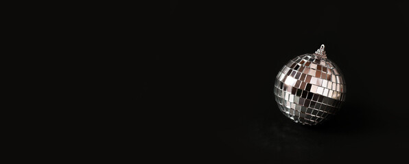Disco ball celebration concept on black background