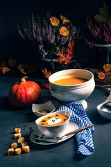 Delicious vegetable pumpkin cream soup with coconut milk