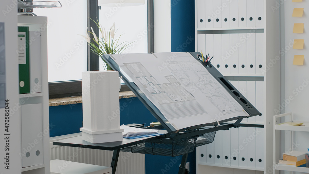 Poster close up of blueprints plan and building model on table in empty space used for construction and arc