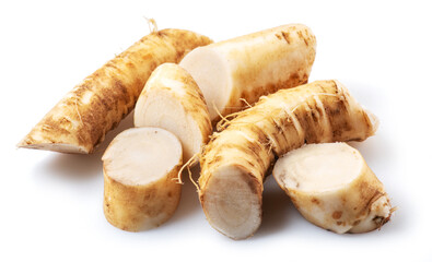 Horseradish roots close up isolated on white background.