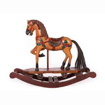Vintage wooden rocking horse toy on white background