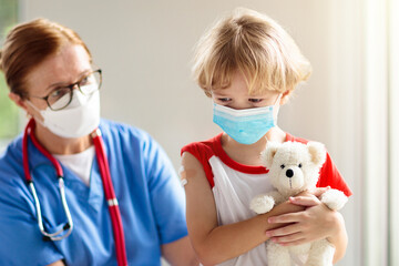 Child covid-19 vaccine. Coronavirus vaccination.