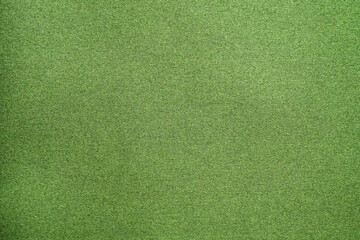 Green fabric texture background close up