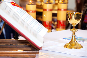 chalice with wine on the altar in the church
