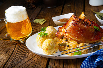 pork knuckle with sauerkraut and sweet mustard