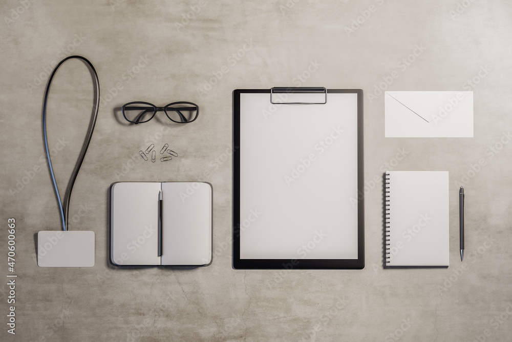Aufkleber top view and close up of empty office supplies on concrete desktop. clipboard, notepad, bad, envelop