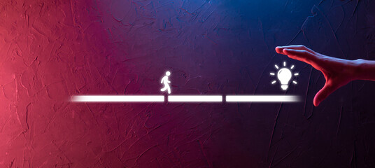 Male business man hand hold a connecting block between two sets of bridge road for a silhouetted man to walk idea icon.