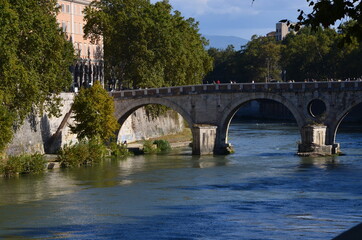 Fototapeta na wymiar Some photos taken during a stroll through the centre of the ancient city of Rome across the river Tiber on a bright, sunny Fall day.