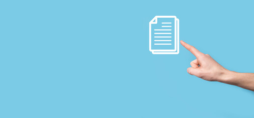 Male hand holding a document icon on blue background. Document Management Data System Business...
