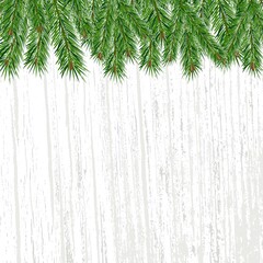Green pine branches on gray wooden background. Place for text. Vector Christmas and New Year background.