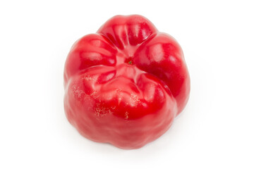 Whole red bell pepper on a white background