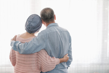 couple senior asian woman is chemotherapy and retirement man is encouragement