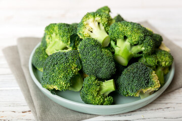 broccoli of fresh green broccoli in bowl over coloredbackground. , close up. Fresh vegetable