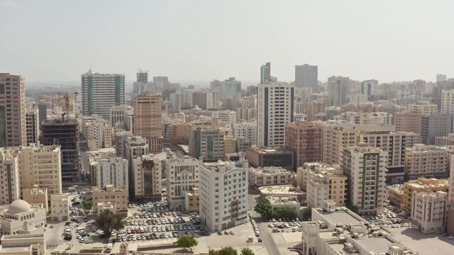 Aerial view Cityscape of Sharjah UAE. High-rise buildings business centers with modern architecture in the city in the desert.