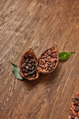 Halved cocoa pods with peeled and unpeeled beans