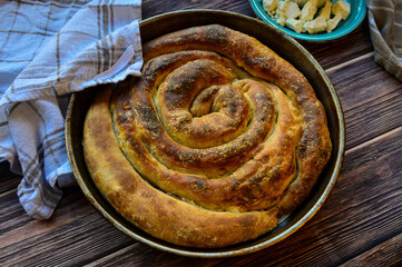 Traditional pastry with handmade dough and cheese filling