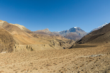 Fototapeta na wymiar Jhong Khola River and Yakwakang mountain. Mustang District, Nepal