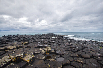 North Ireland Sea Coast Sunset,  Atrim landscapes, Giants of Causeway , North Ireland, Land of Myths and Legends Ireland, Stone pillars, Cliffs and Rocks, North Ireland