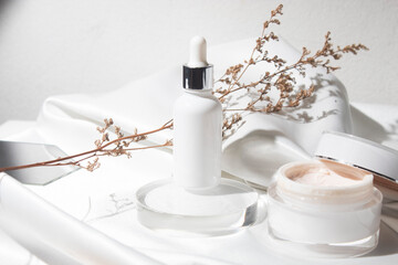 white wood table background with lifestyle, cosmetic makeup bottle lotion cream product with beauty...