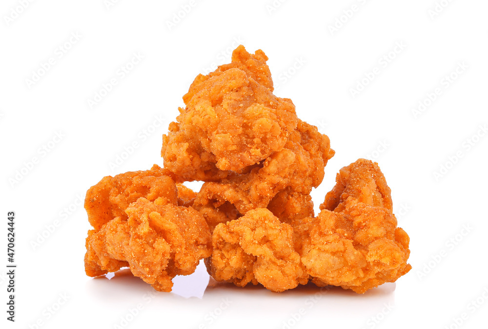 Wall mural fried popcorn spicy chicken isolated on white background.