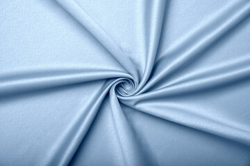 Background, texture. Template. Satin cloth for wedding and evening dresses. A nude shade.