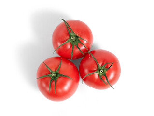 Three fresh tomatoes top view isolated from the background