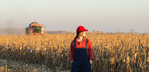 Farmer girl at corn harvest